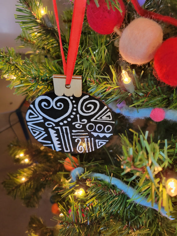 Wood Sankofa linework ornament